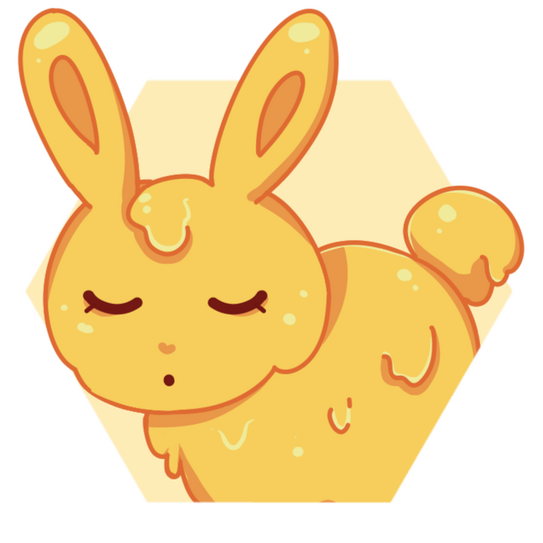 The bunny made of honey has its eyes closed.